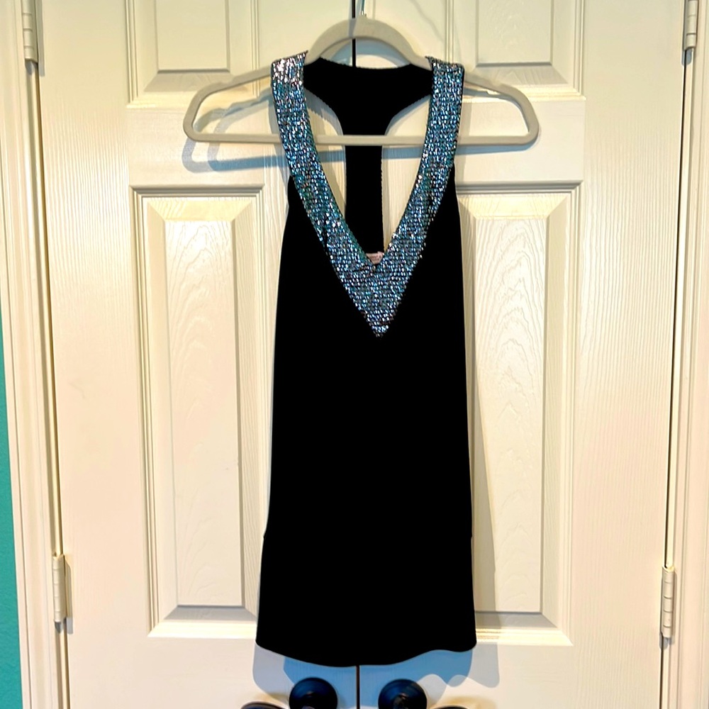 BLACK STRETCH TOP WITH SEQUINS AND FITTED WAISTBAND